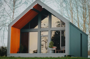 Sniegi design cabin with sauna